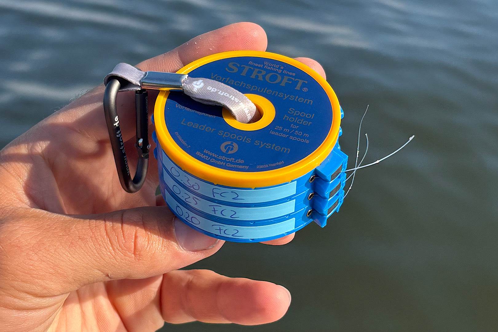 Complete Stroft Spool Leader System set with fluorocarbon leaders ready to fish